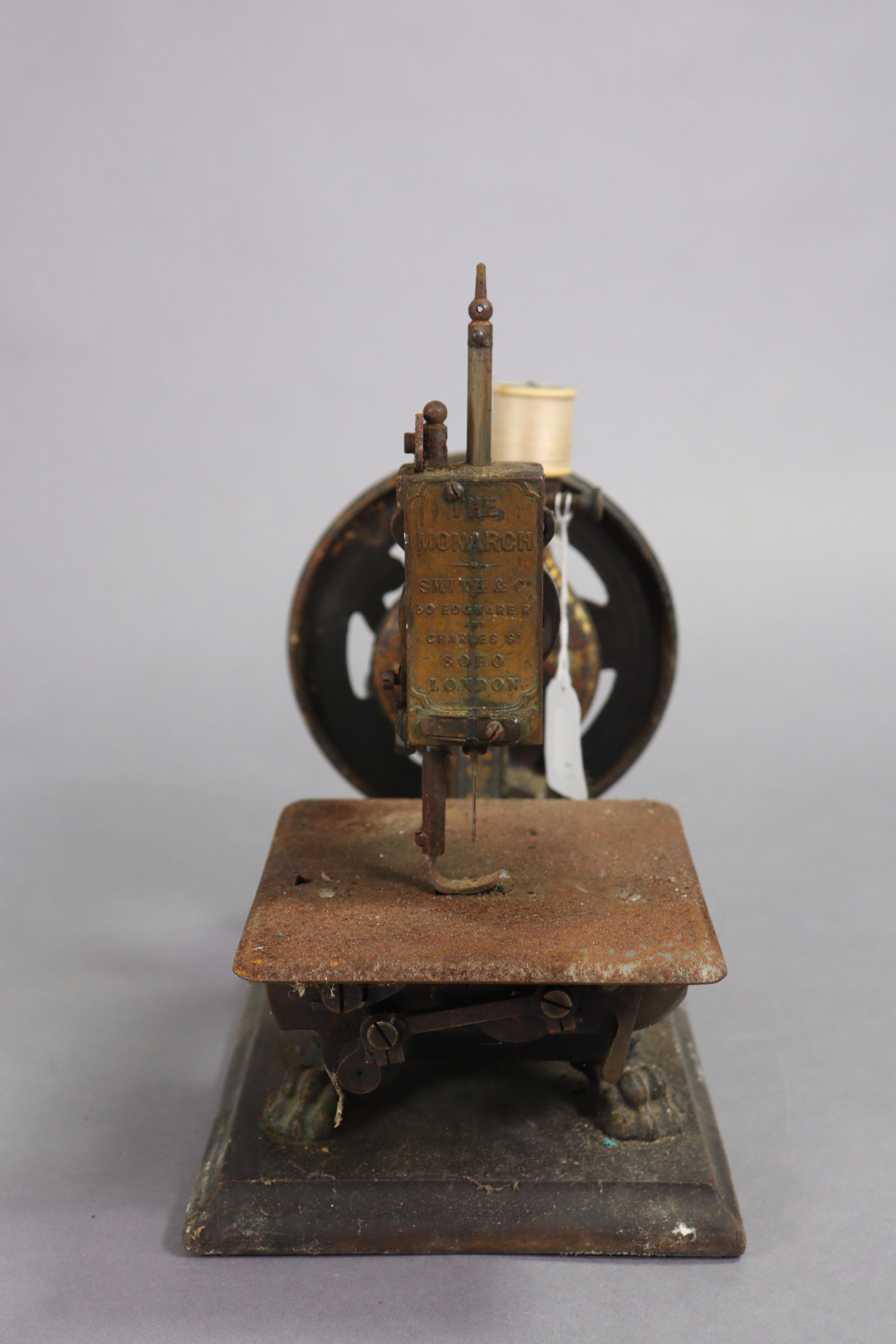 A late 19th century “Monarch” sewing machine by Smith & Co. of London, 28.5cm long, uncased. - Image 2 of 5