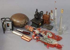 An eastern painted wooden & cloth-covered puppet; a reproduction coffee grinder; various glass