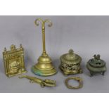 A Chinese bronze incense burner of squat round form, having foo-dog finial to the lid, & on three