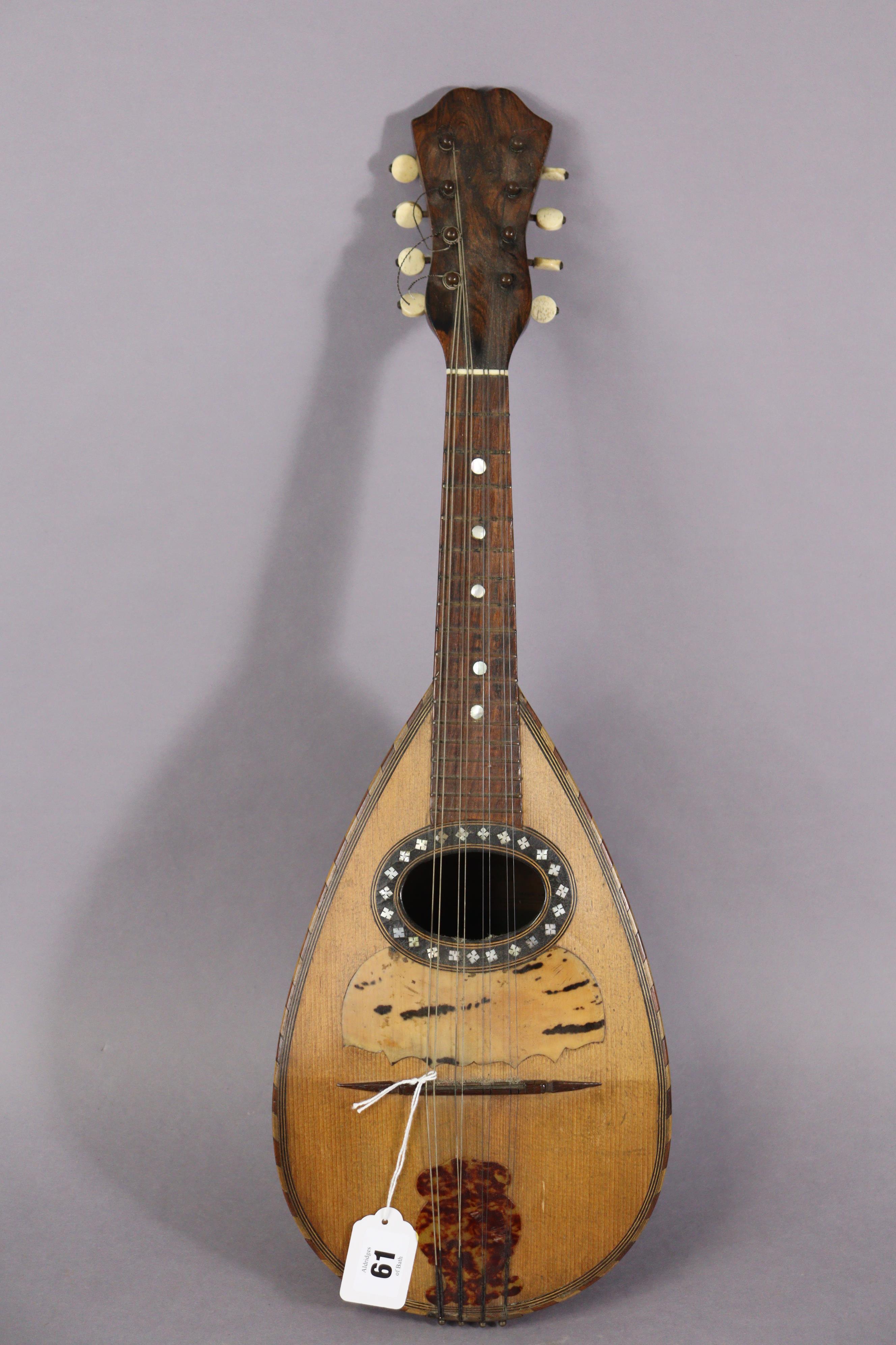 An Italian mandolin, 61cm long.