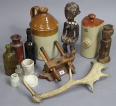 A carpenter’s plane; two ethnic carved wooden figures; a section of stag’s antlers; & various