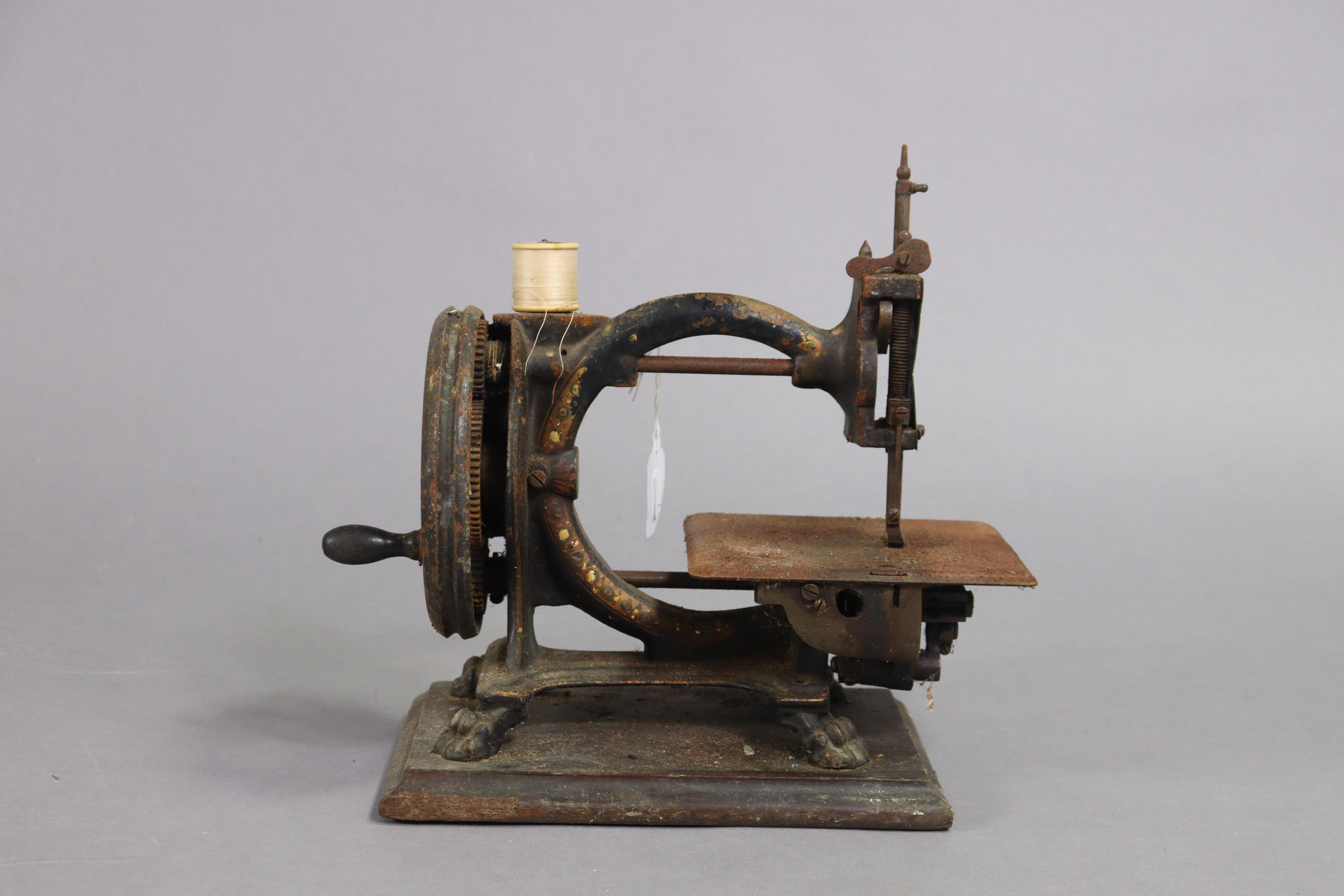 A late 19th century “Monarch” sewing machine by Smith & Co. of London, 28.5cm long, uncased. - Image 5 of 5