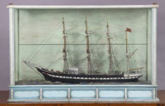 A late 19th/early 20th century DISPLAY OF A PAINTED WOODEN BRITISH SAILING VESSEL BUILT BY JOSEPH