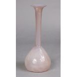 A 20th century Clutha-type glass vase of pale opalescent tone with tall, flared neck on conical