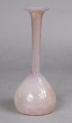A 20th century Clutha-type glass vase of pale opalescent tone with tall, flared neck on conical