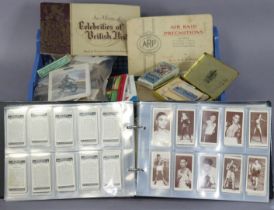 Twenty various cigarette & tea picture card albums; & various other loose trade cards.