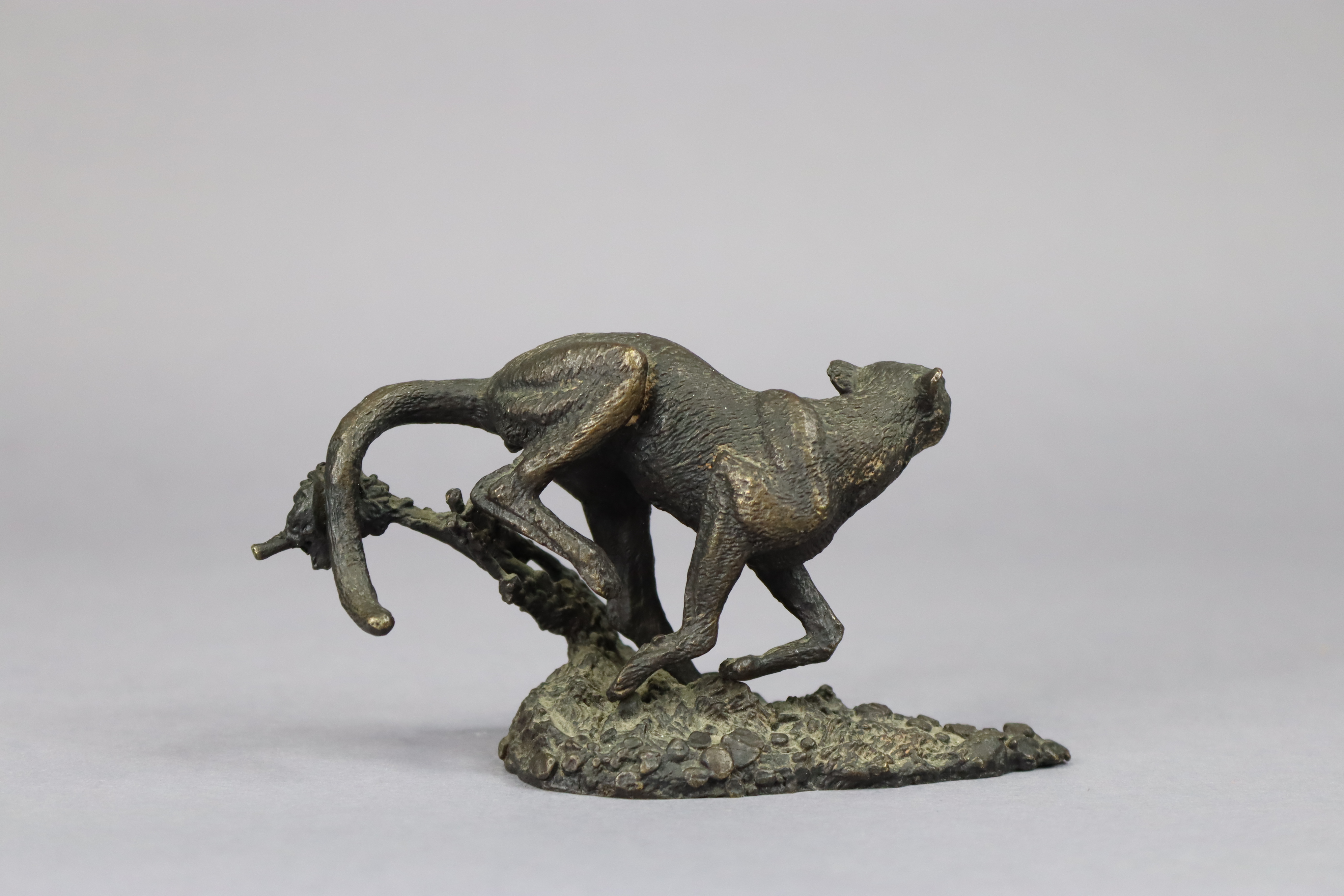 A small, bronzed ornament in the form of a wild cat, signed Mene, 13cm wide x 6.75cm high. - Image 3 of 4