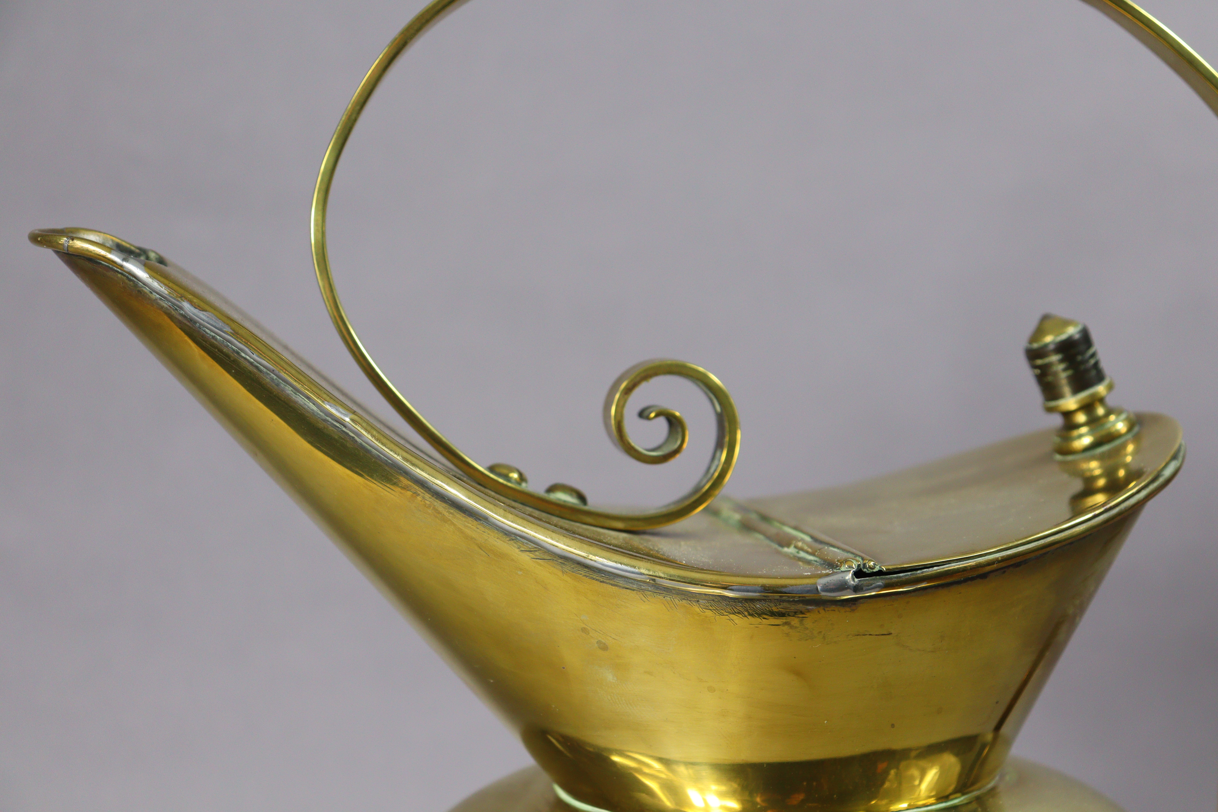 A late 19th century brass water jug designed by Christopher Dresser for Benham & Froud, with - Image 5 of 7