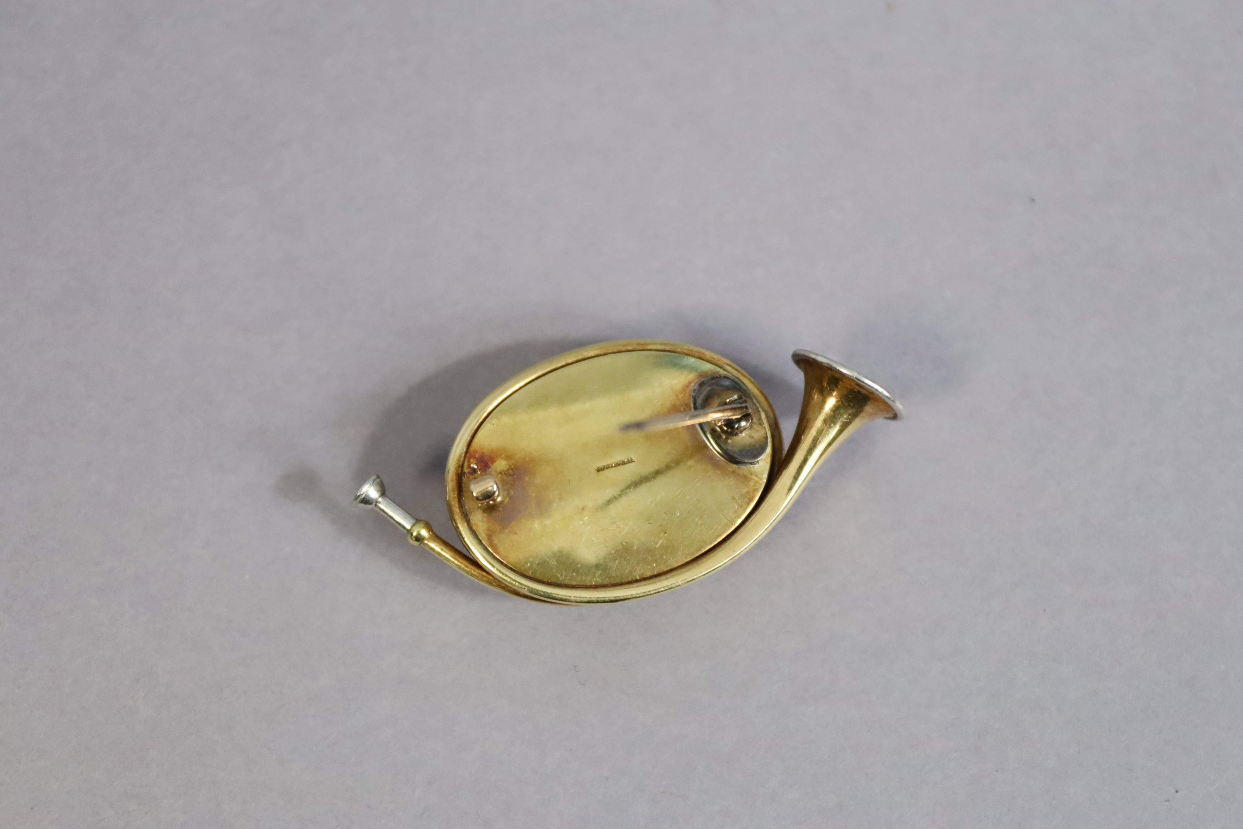 A Tiffany & Co yellow & white-metal novelty hunting horn brooch inset with Essex crystal fox - Image 4 of 4