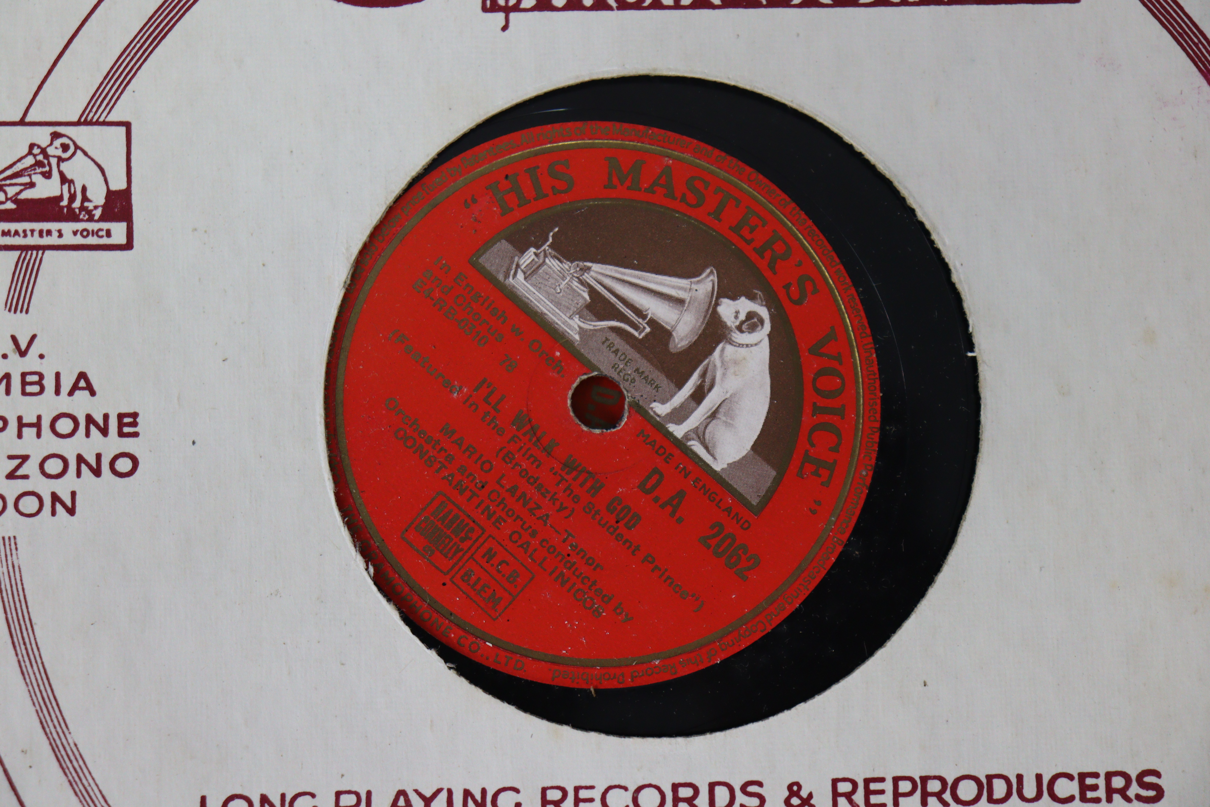 A vintage HMV portable gramophone in a red fibre-covered case; & six 78 r.p.m. records. - Bild 8 aus 9