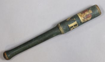 A Victorian turned wooden polychrome painted tipstaff, with “VR” below a coronet, _cm long.
