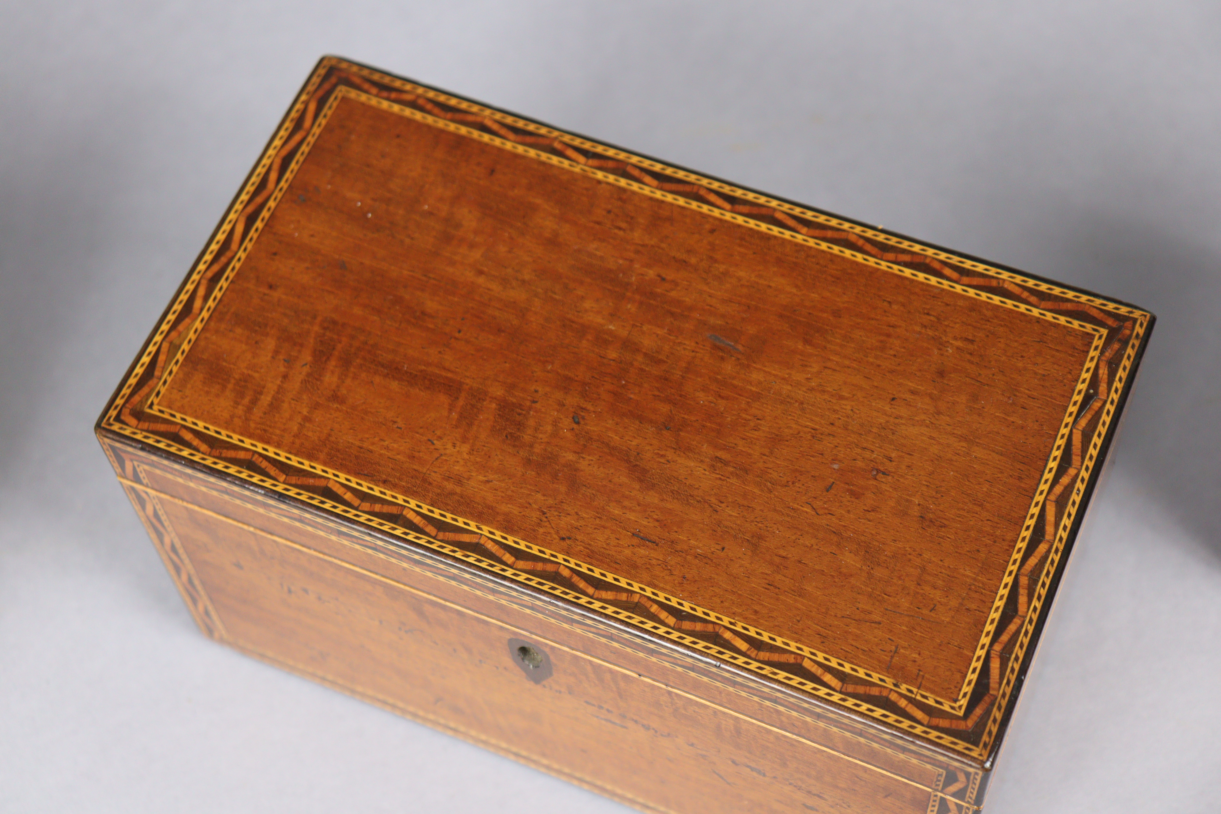 An early 19th century inlaid-mahogany two-division tea caddy, 23cm wide x 12.7cm high x 12.7cm deep; - Image 4 of 7