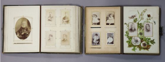 Two late 19th/early 20th century leather-bound family photograph albums containing a total of one