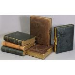 Six Victorian Morocco leather-covered photograph albums.