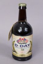 A bottle of Badger Breweries “50th Anniversary D-Day” commemorative Ale (500ml, with contents).