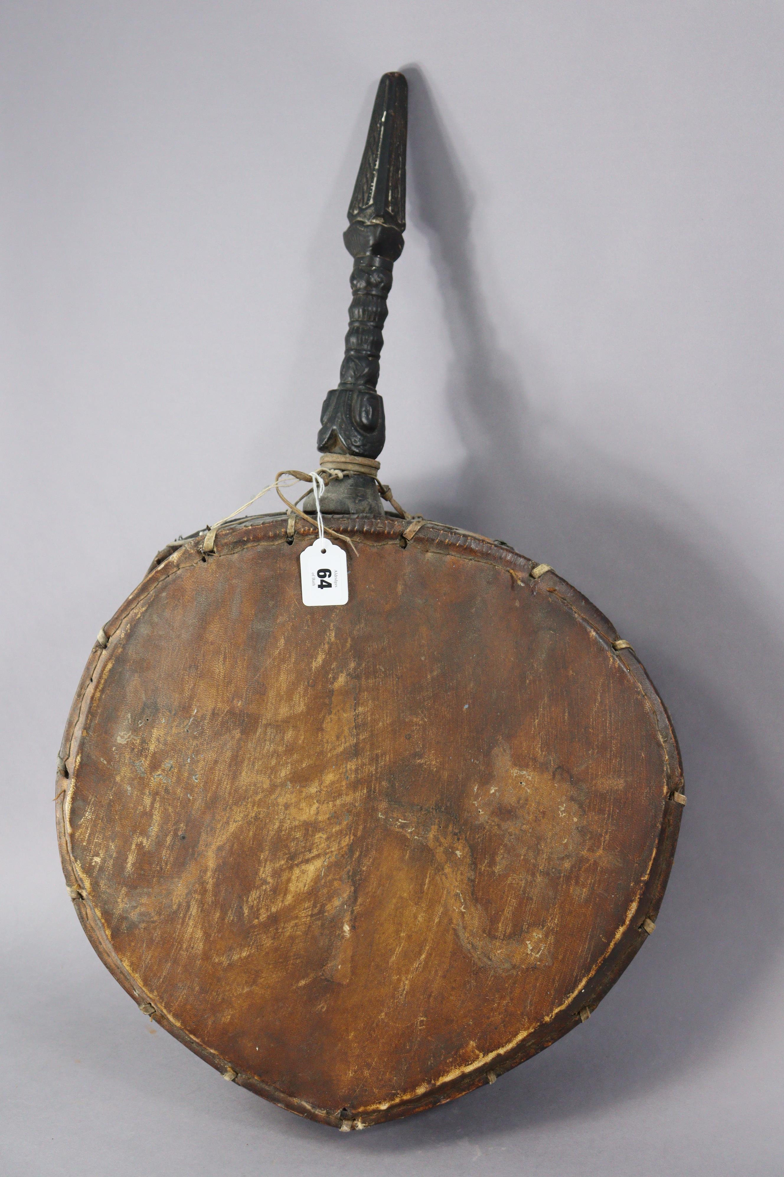 A Nepalese shaman’s drum or Dhyango having an ebonised & carved wooden handle, 44cm diameter x - Image 3 of 6