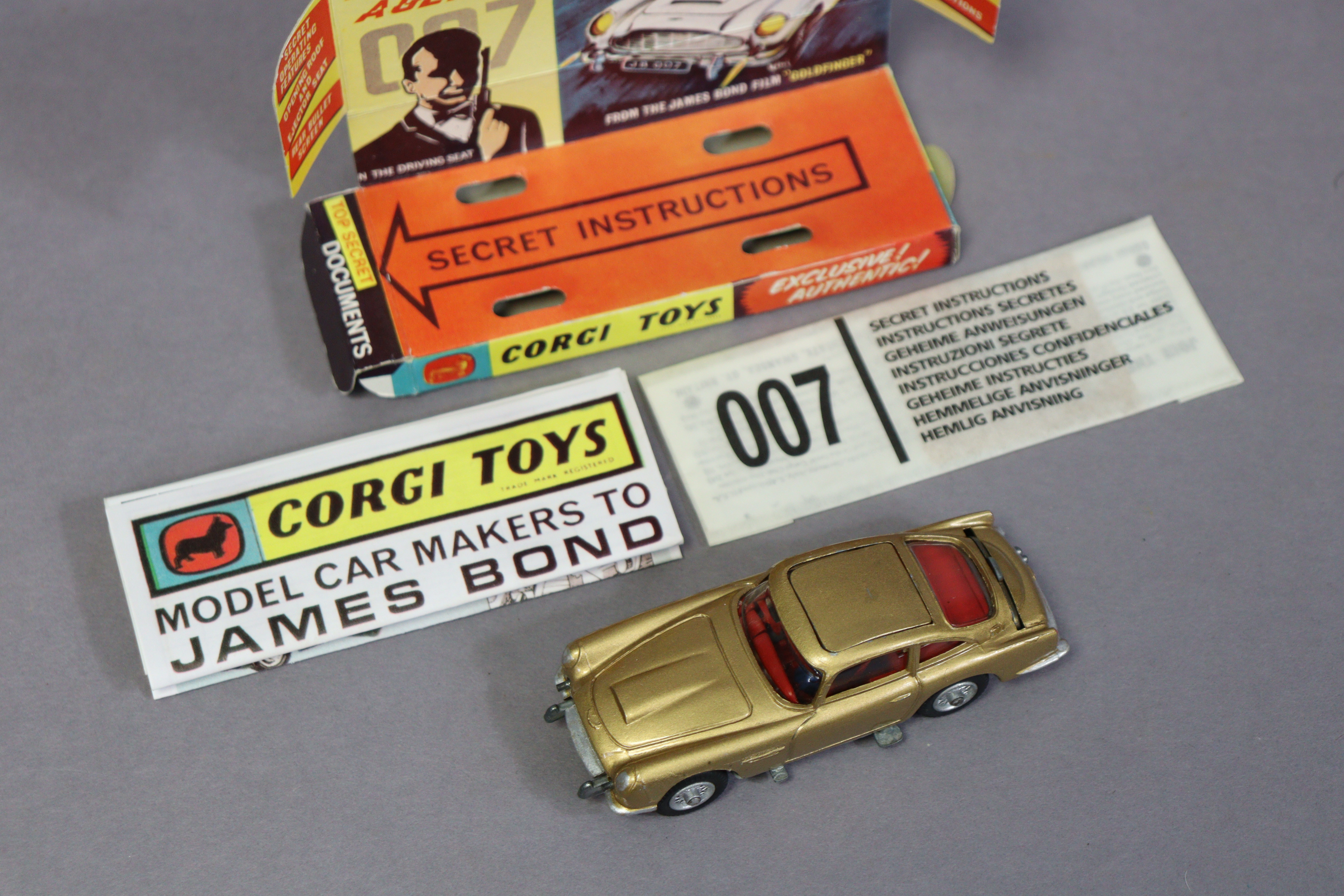 A replica corgi die-cast scale model of “james bond’s aston martin d.b.s” with secret - Image 3 of 3