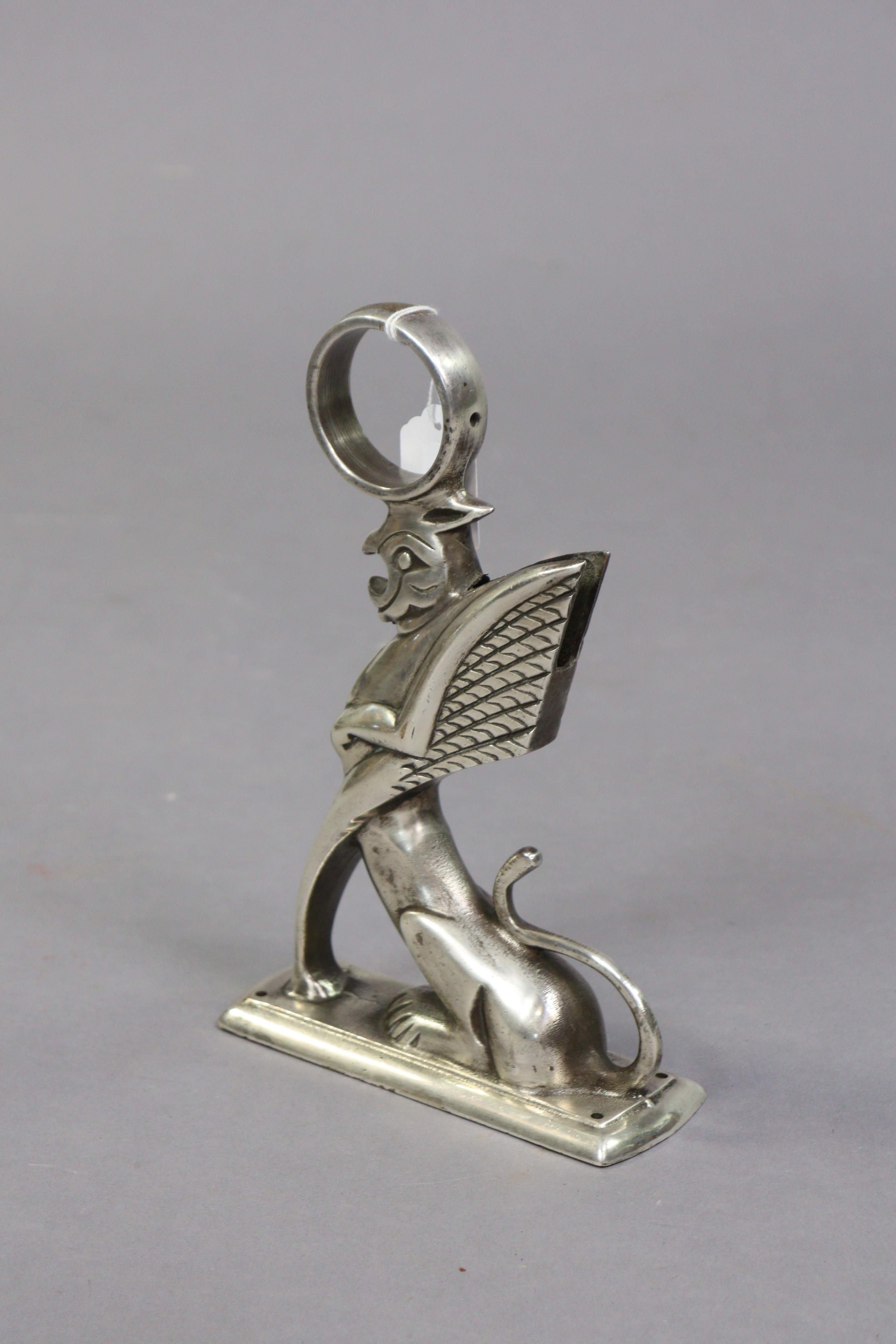 An art deco-style silvered-metal griffin foot-rail bracket, 26.5cm high. - Image 3 of 4