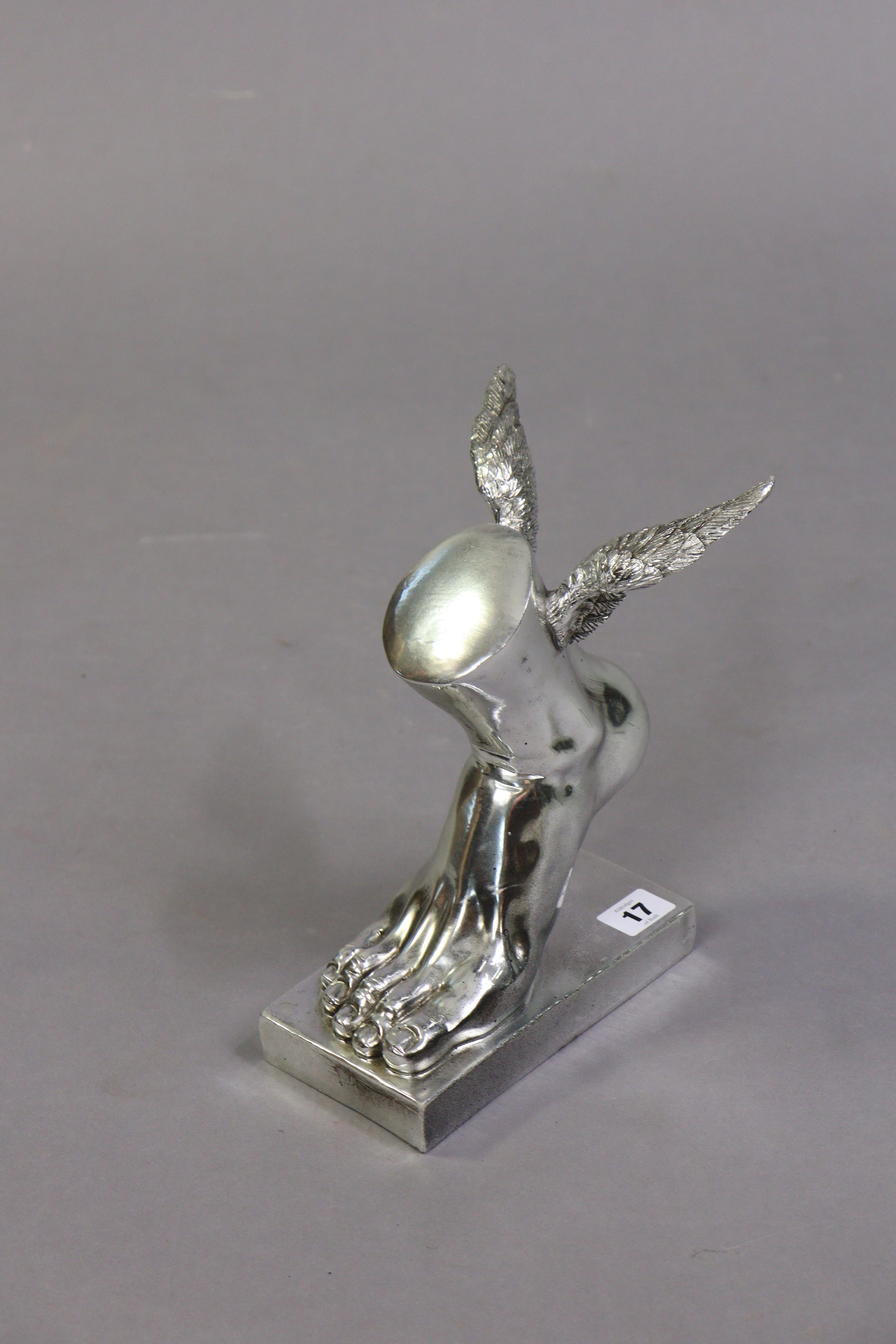 A silvered-finish composition “Mercury winged foot” on a rectangular plinth base, 24.5cm high. - Image 2 of 3