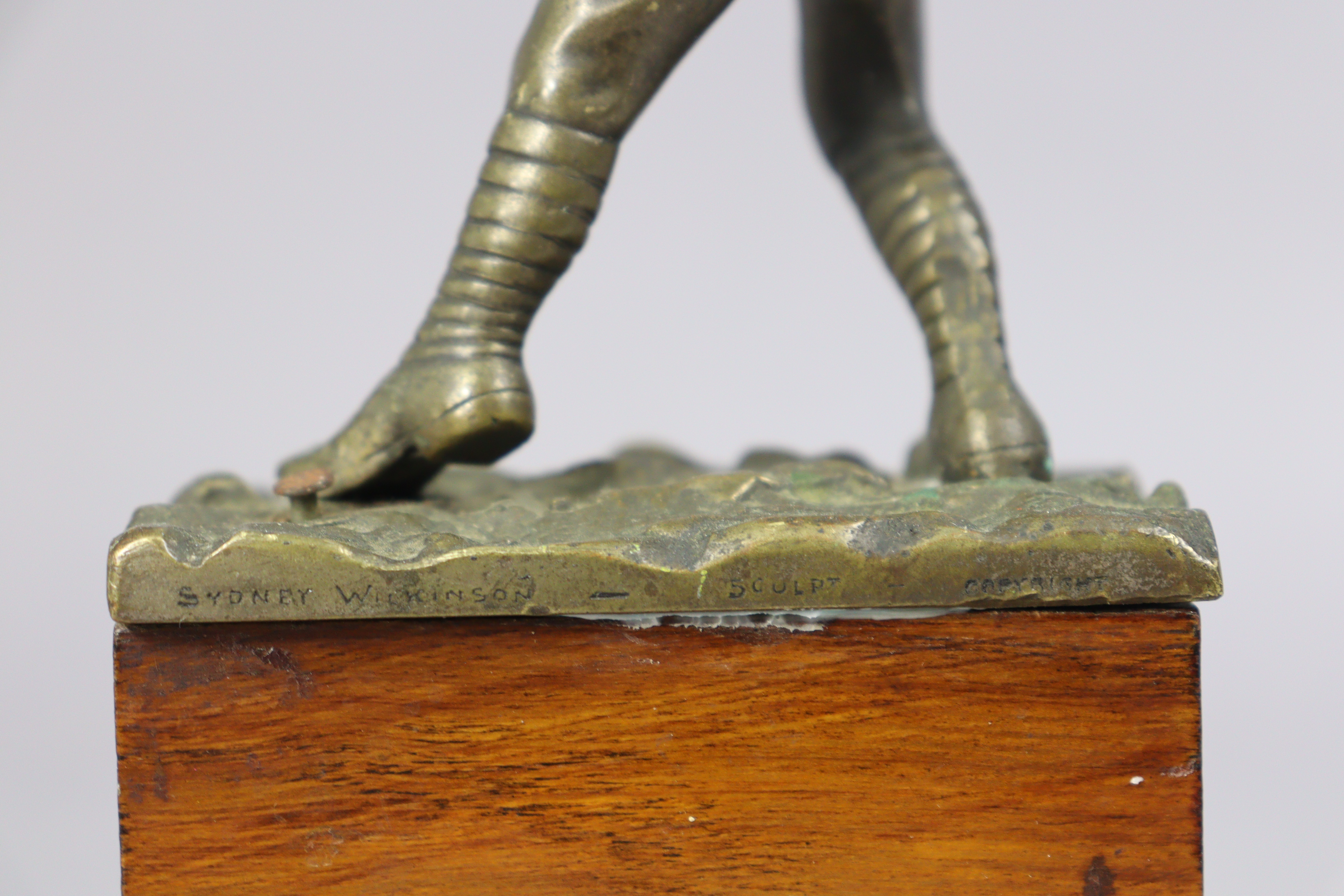 A bronzed sculpture of a WWI standing soldier figure throwing a grenade, signed to reverse “Sydney - Image 4 of 4