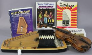 A vintage violin, 59cm long, an Oscar Schmidt autoharp, cased, and a small quantity of autoharp