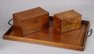 An early 19th century inlaid-mahogany two-division tea caddy, 23cm wide x 12.7cm high x 12.7cm deep;