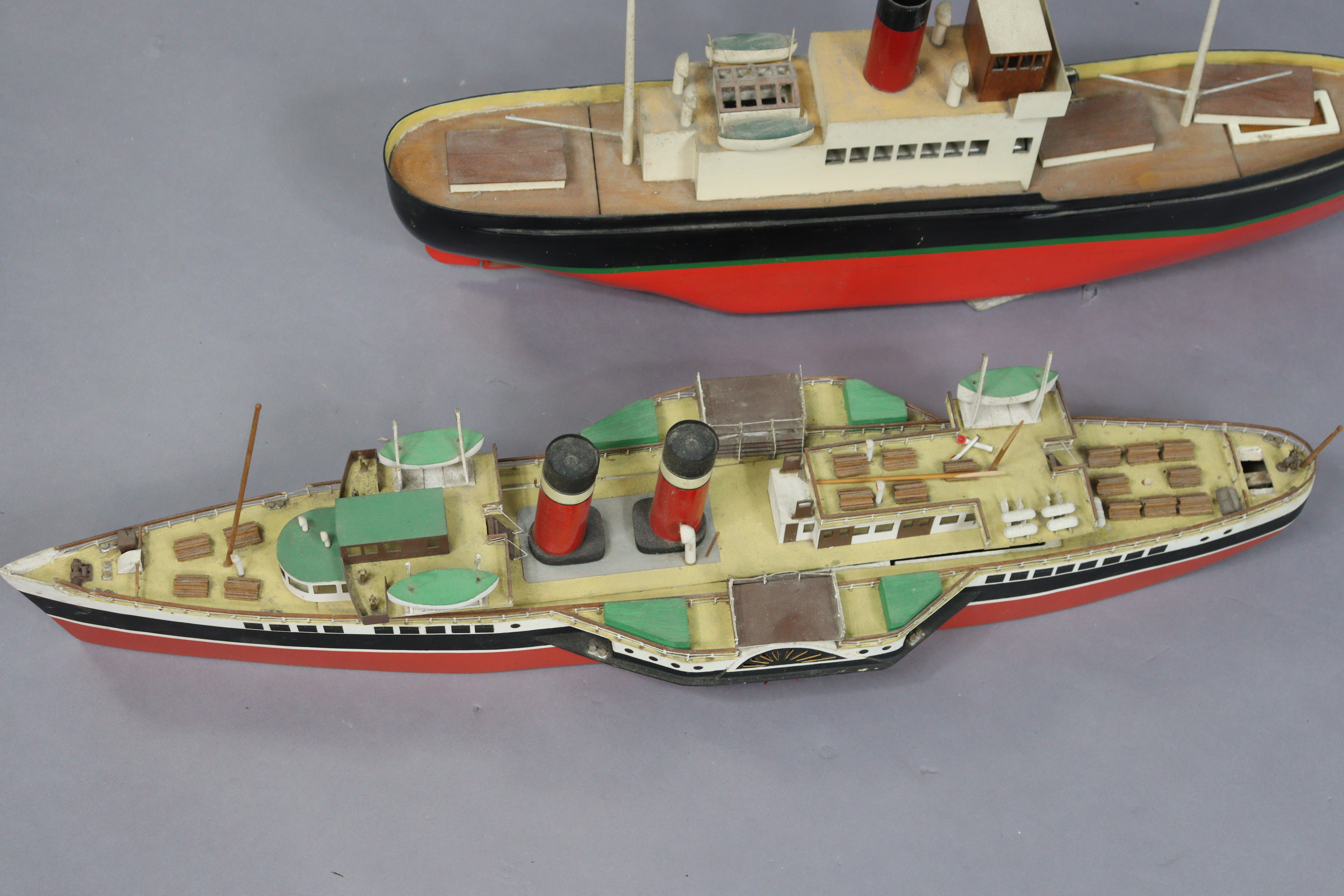 A painted wooden & metal model steamboat fitted with a Mamod engine, 69cm long, and a painted wooden - Image 7 of 7