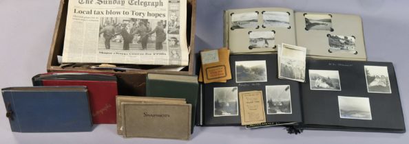 A collection of family photographs in four albums & loose; & various items of ephemera.