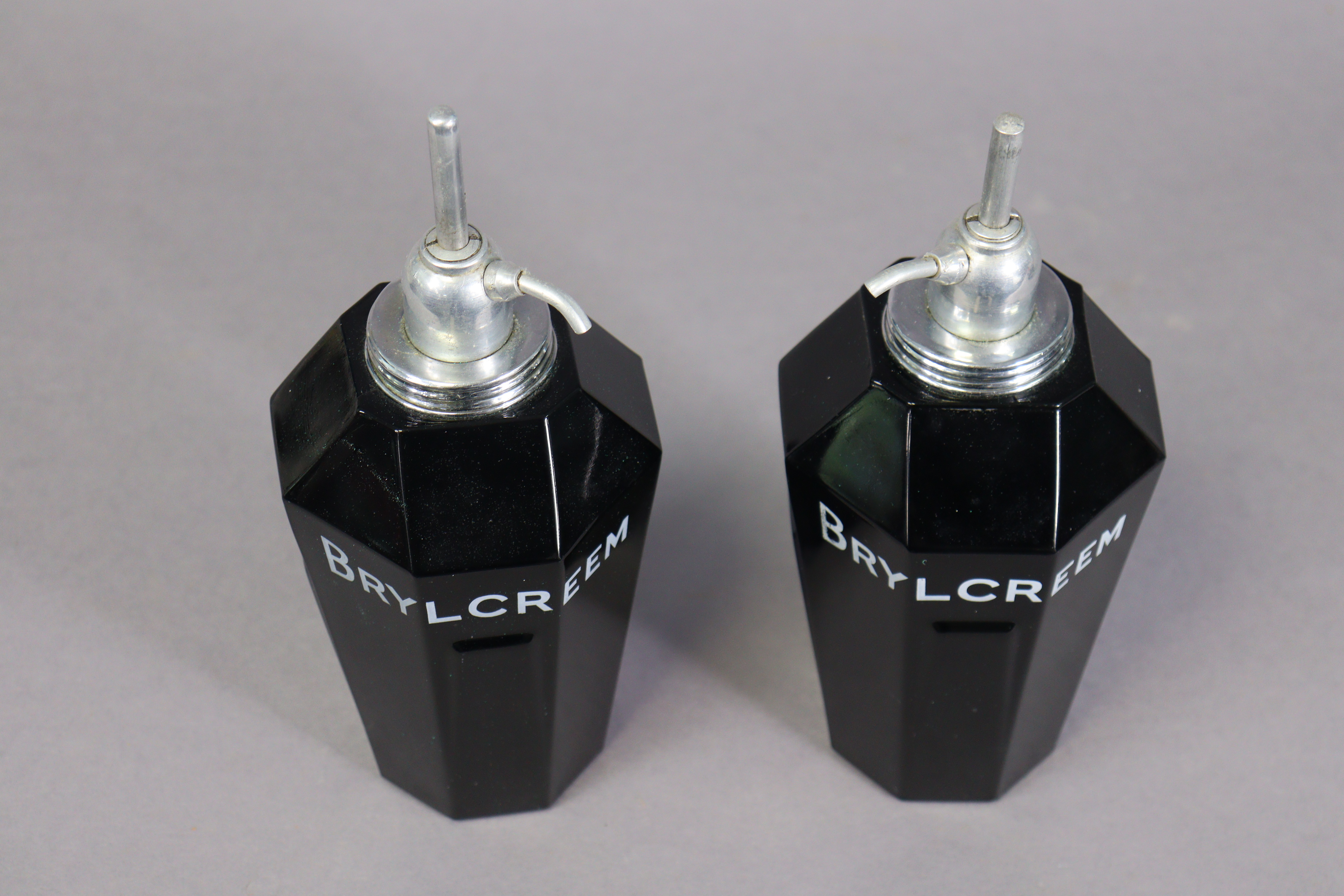 A pair of mid-20th century “BRYLCREEM” opaque-glass barber’s dispensers, 25cm high. - Image 3 of 5