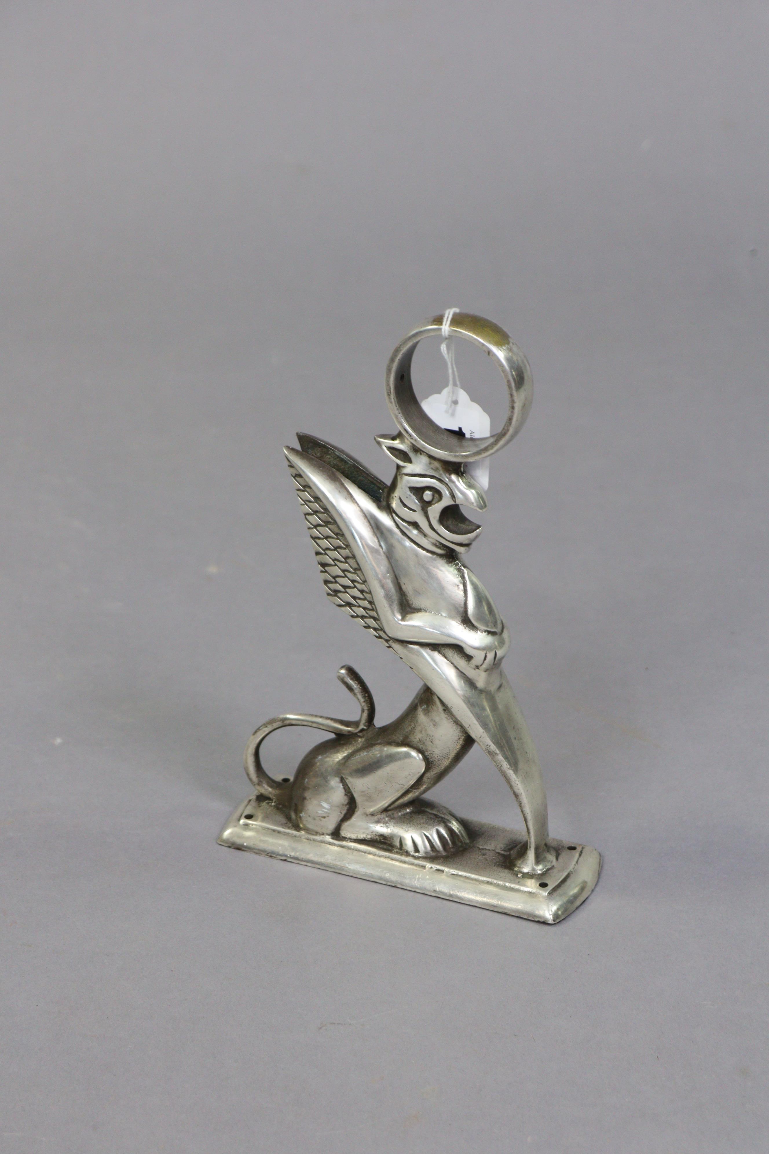 An art deco-style silvered-metal griffin foot-rail bracket, 26.5cm high. - Image 2 of 4