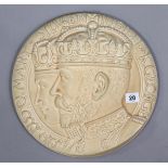 A Burleigh ware pottery circular wall plaque commemorating the silver Jubilee of King George & Queen