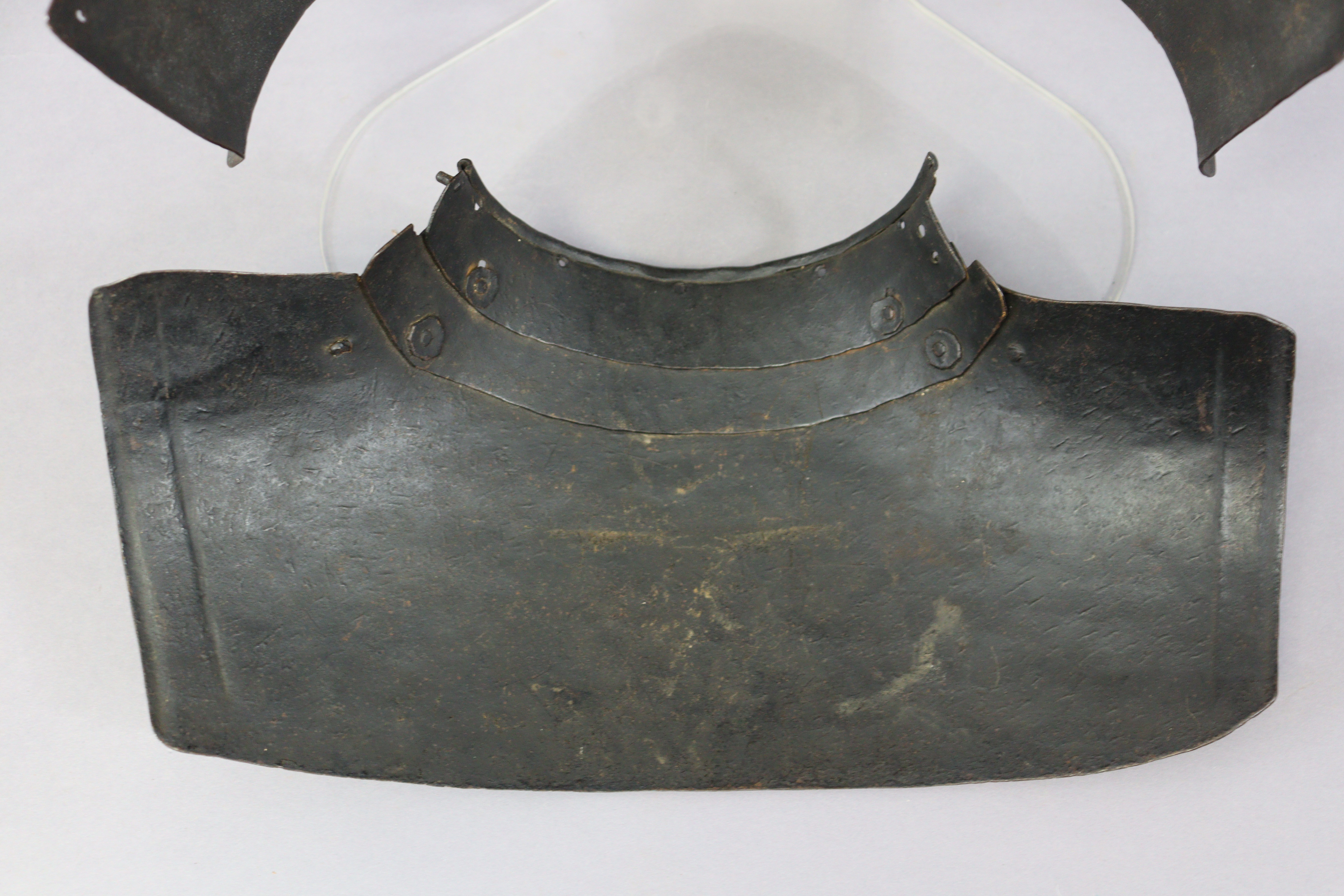 An English Civil War period lobster-tail steel helmet & breastplate, the pot helmet of typical form, - Image 11 of 11