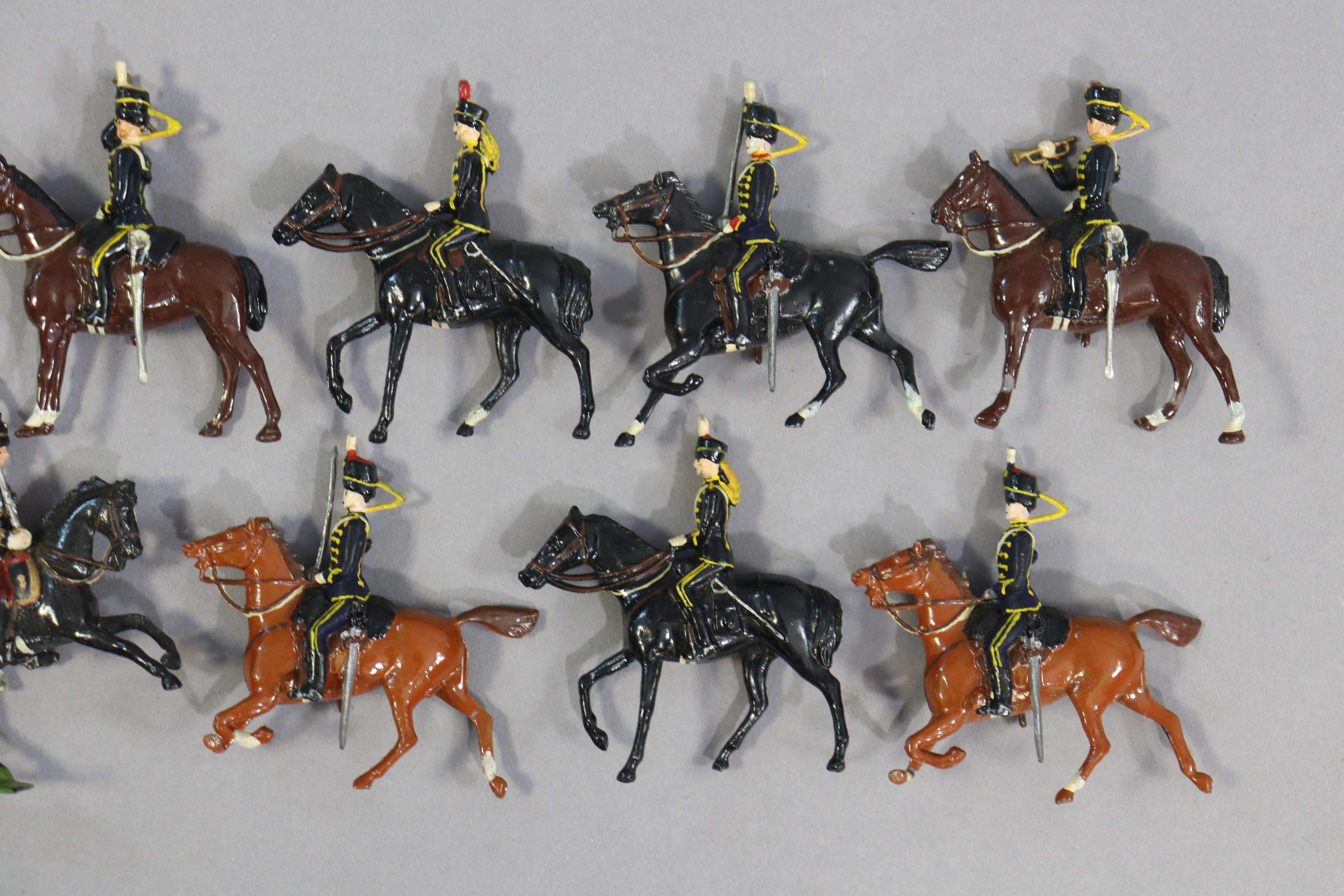 Twelve Britain’s painted lead equestrian soldier figures. - Image 3 of 3