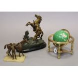 A small geological specimen globe, 24cm diameter; a Spelter Marley horse ornament, 29cm high; & a