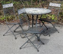 A painted metal fold-away circular garden table & matching set of three fold-away chairs, each with