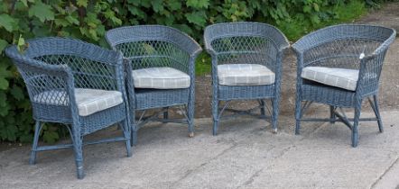 A set of four Marston & Langinger light blue painted cane & wicker conservatory chairs.