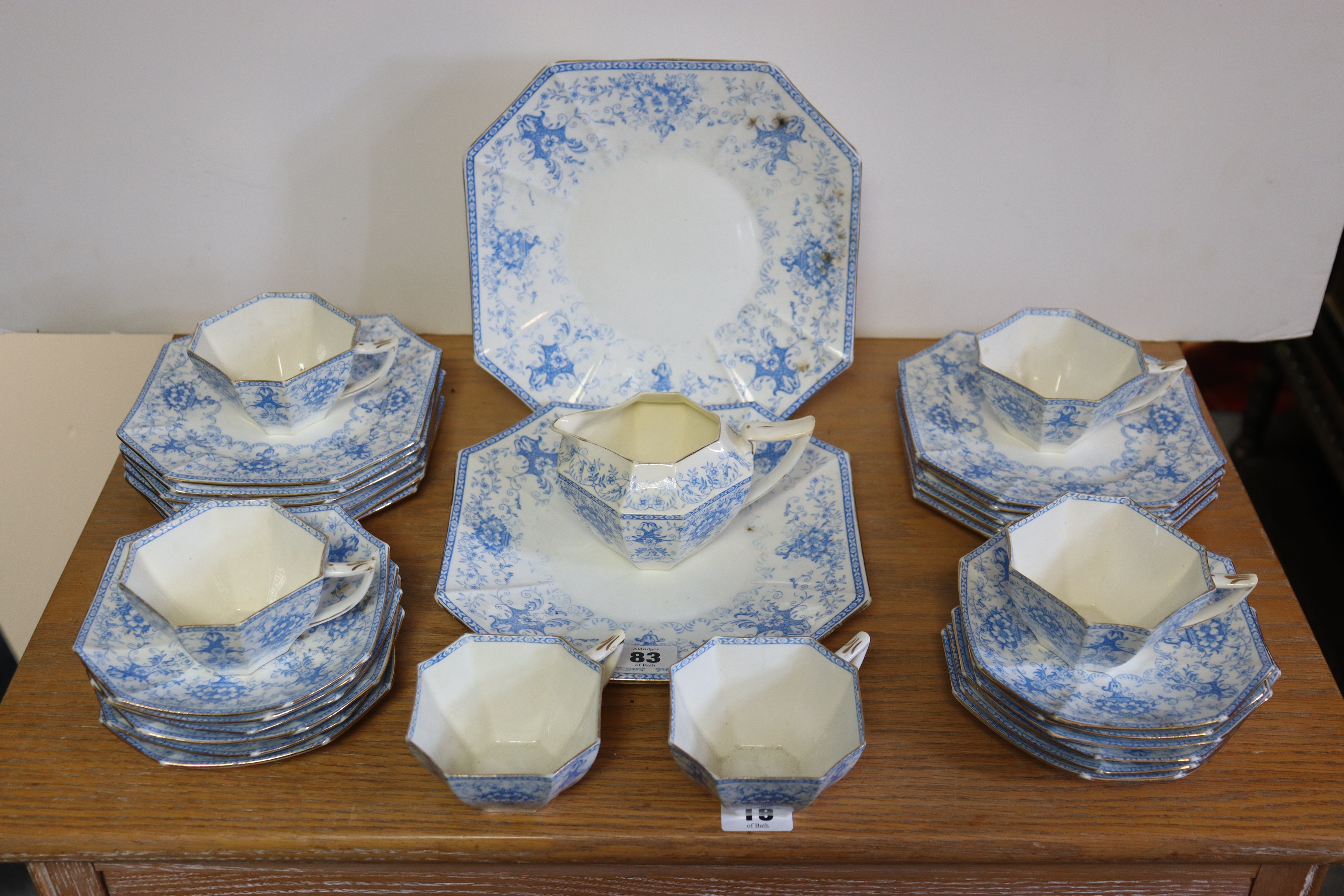 A Foley china blue & white floral decorated thirty-two-piece part tea service; a Coalport white
