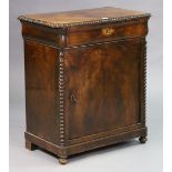 A 19th century continental small walnut side cabinet having a beaded edge, fitted frieze drawer