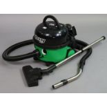 A Numatic “Henry Pet” vacuum cleaner.