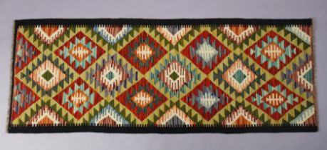 A Maimana kilim runner of multi-coloured geometric design, 188cm x 70cm.