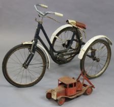 A mid-20th century child’s tricycle (blue); & a triang-type model two-truck, 42cm long.