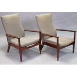 A pair of mid-20th-century Parker Knoll armchairs each with a padded back & loose cushion to seat