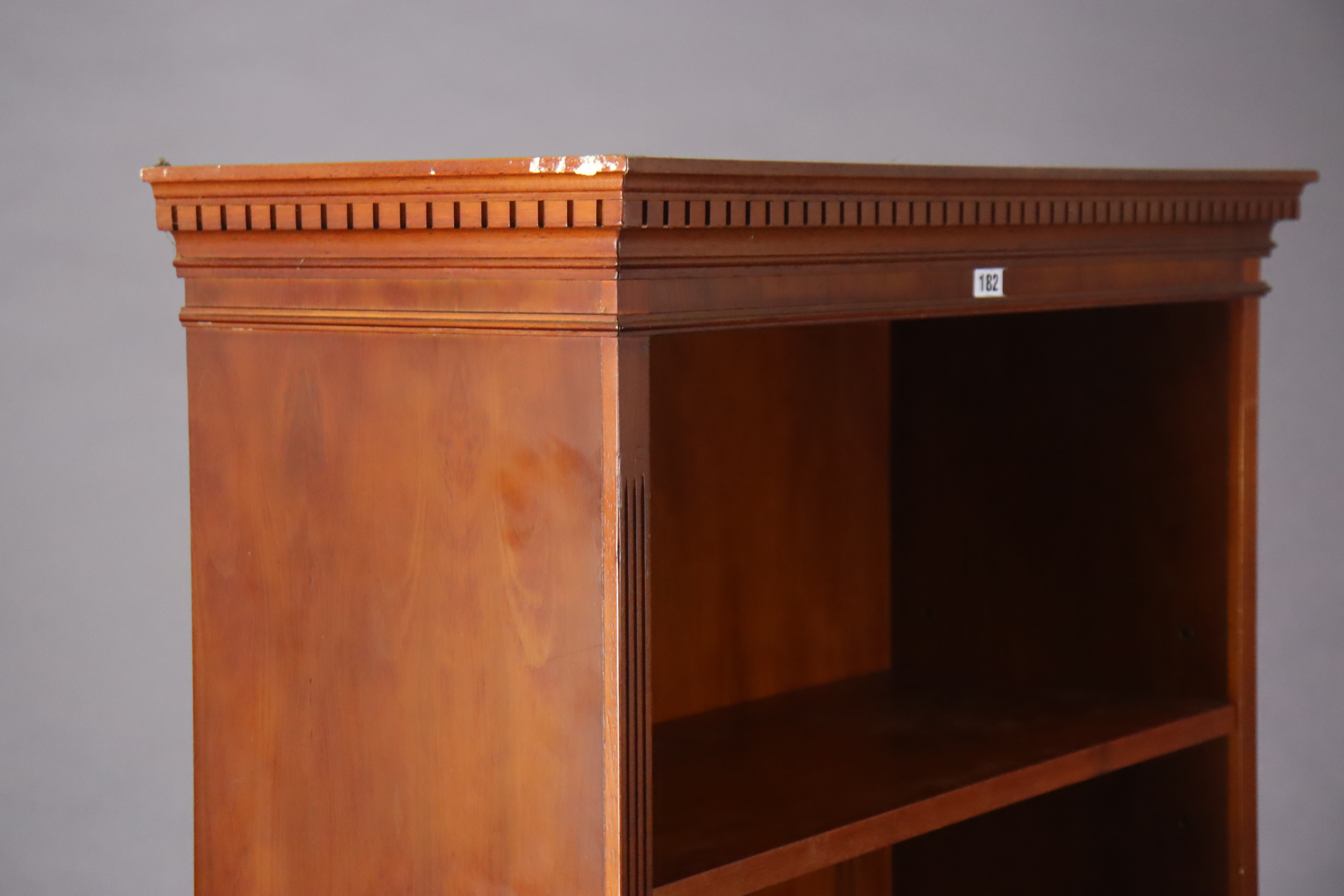 A yew wood tall standing open bookcase with five adjustable shelves, & on a shaped plinth base, 76. - Image 5 of 6