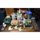 Various items of decorative china & pottery; together with numerous advertising tins; a shell-