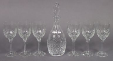 An Edinburgh cut-glass mallet-shaped decanter with a finial stopper, 33cm high; & a ditto set of six