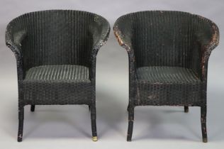 A pair of black painted Lloyd Loom basket chairs.