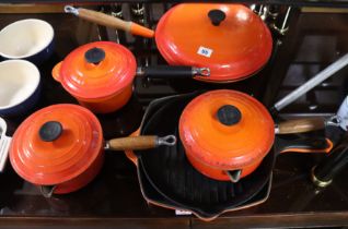 Eleven various items of Le Creuset enamelled kitchenware.