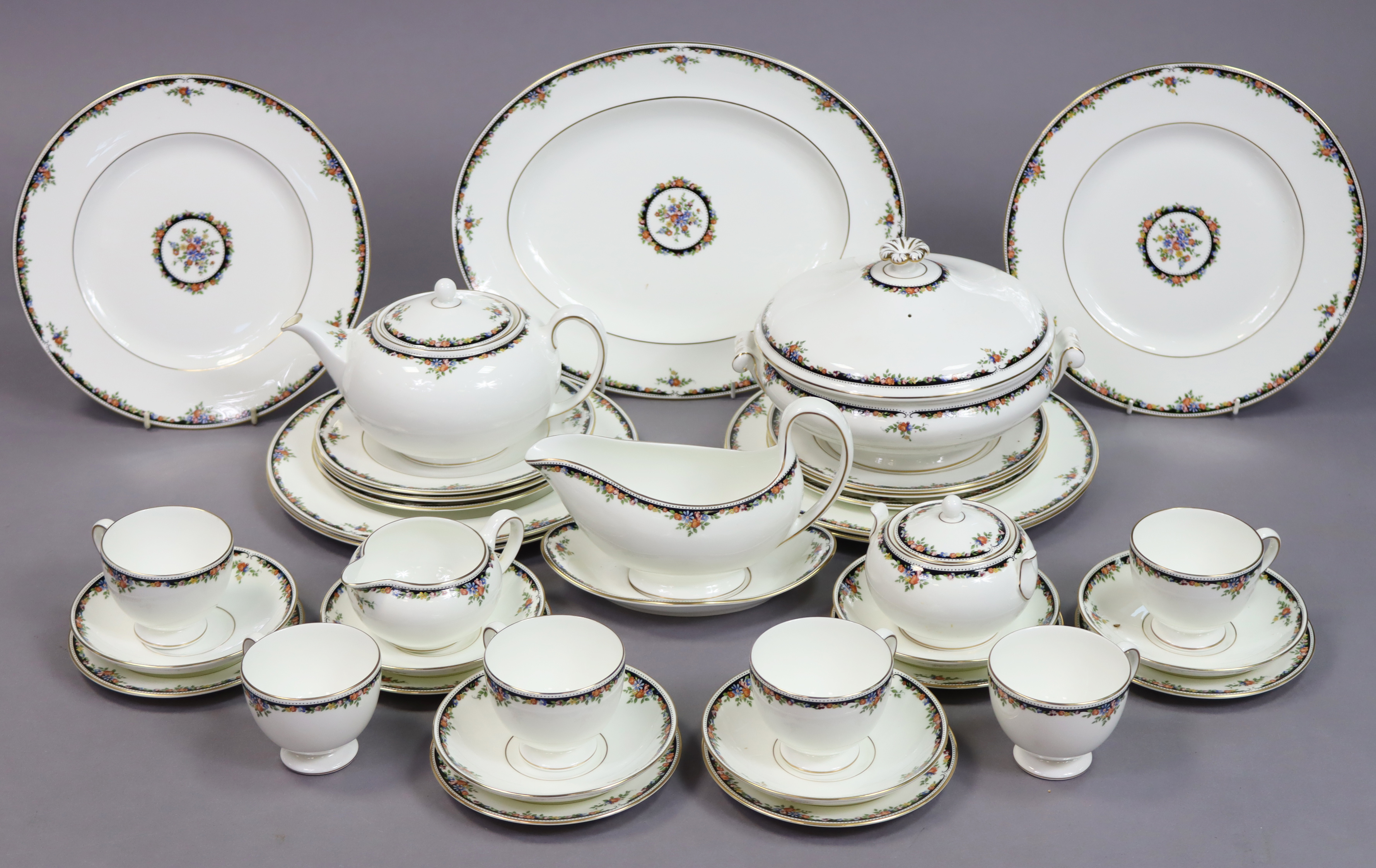 A Wedgwood bone china “Osborne” thirty-six-piece dinner & tea service, settings for six.