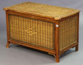 A wicker blanket box with a hinged lift-lid, 89cm wide x 55.5cm high x 51cm deep.
