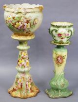 Two floral decorated pottery jardinières & stands, slight faults.